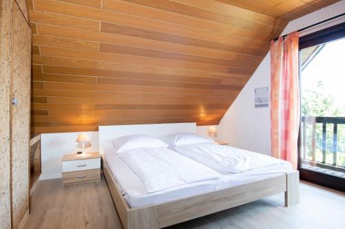 Cama o camas de una habitación en Ostseestübchen