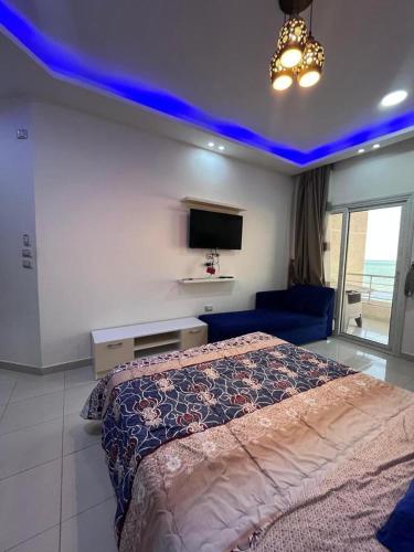 Ένα ή περισσότερα κρεβάτια σε δωμάτιο στο Casablanca Beach for families only