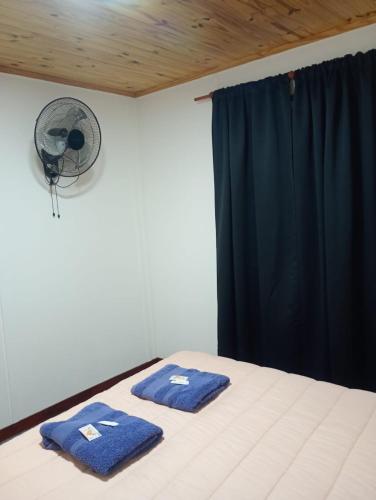 Postel nebo postele na pokoji v ubytování Hospedaje Oscar