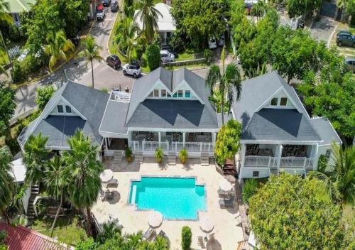 an aerial view of a house with a swimming pool at Shamrock Orient Bay in Orient Bay