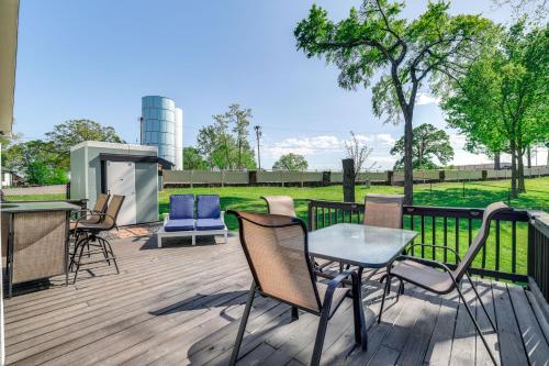 a deck with chairs and a table and a grill at Less Than 1 Mi to Golf and Marina Inviting Home in Afton! in Afton