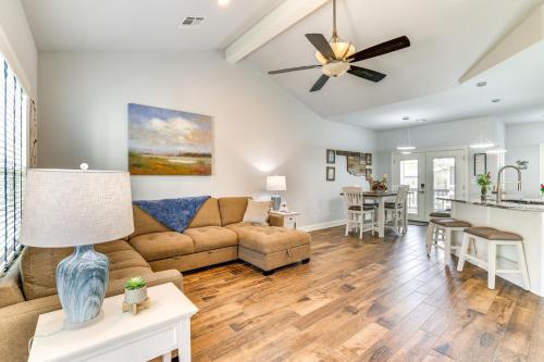 a living room with a couch and a table at Less Than 1 Mi to Golf and Marina Inviting Home in Afton! in Afton