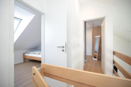 Postel nebo postele na pokoji v ubytování Rosengarten am Feldrand