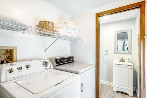 a kitchen with a sink and a dishwasher at Kent Condo - 39260 Retreat in Bethany Beach
