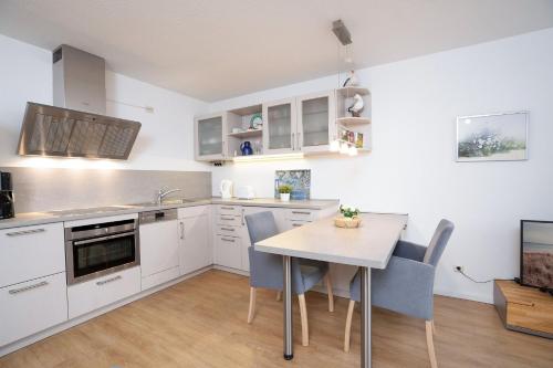 Kuchyň nebo kuchyňský kout v ubytování Strandresidenz Wohnung 1