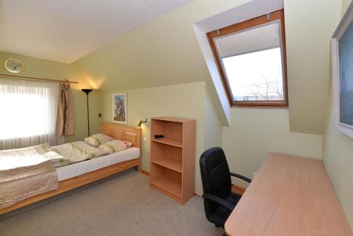מיטה או מיטות בחדר ב-Rambyno apartamentai