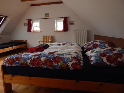 a bedroom with two beds in a attic at B&B Annabelle in Schüttorf