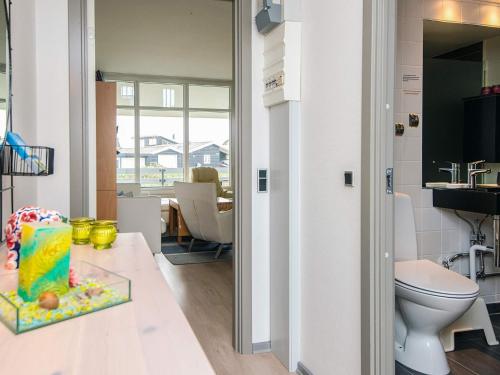 Et badeværelse på Cozy Retreat in Sondervig - By Traum Ferienwohnungen