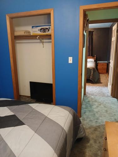 Postel nebo postele na pokoji v ubytování Northland Home