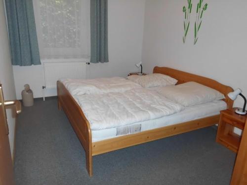 a bed sitting in a room with at Scheel I in Schlagsdorf