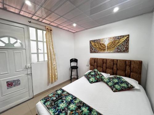 Postel nebo postele na pokoji v ubytování Habitación con baño privado 2