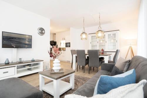 Una televisión o centro de entretenimiento en KellenHus Wohnung 4