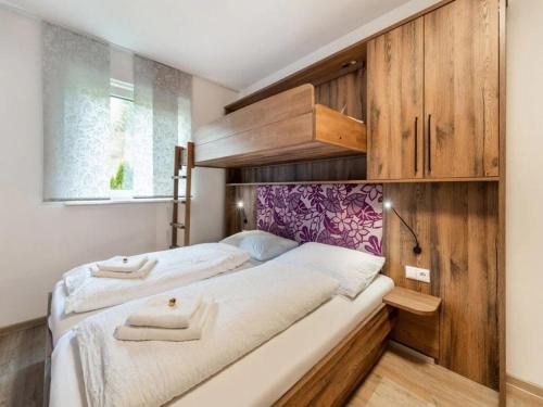 Una cama o camas en una habitación de Slunce