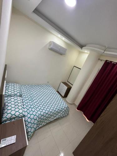 Ένα ή περισσότερα κρεβάτια σε δωμάτιο στο Casablanca Beach for families only