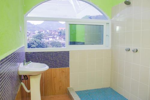 Ένα μπάνιο στο Vista Verde Lodge