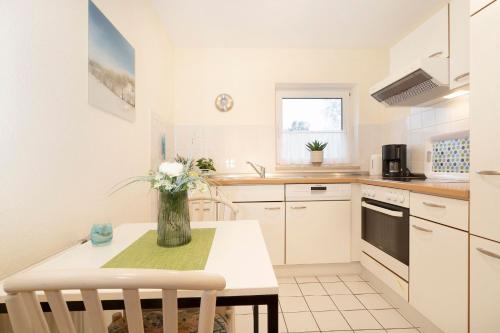 Η κουζίνα ή μικρή κουζίνα στο Lindenbuschen 2 Wohnung 5