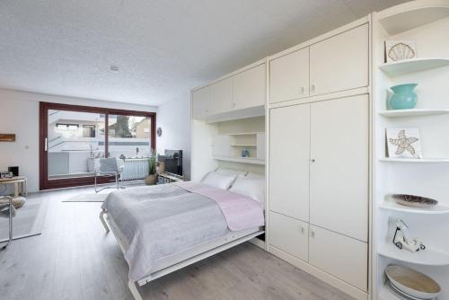 Postel nebo postele na pokoji v ubytování Sea-Loft