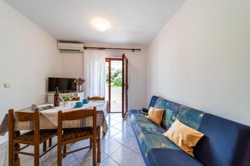 Apartments with parking space Rab - 24367