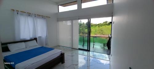 Ένα ή περισσότερα κρεβάτια σε δωμάτιο στο Finca Villa Glamping