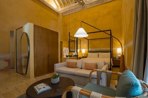 Postel nebo postele na pokoji v ubytování Casa Carolina Hotel Cartagena