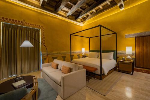 Postel nebo postele na pokoji v ubytování Casa Carolina Hotel Cartagena