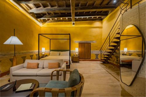 Postel nebo postele na pokoji v ubytování Casa Carolina Hotel Cartagena