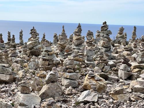 a pile of rocks on a rocky beach at Holiday Home in Hanvec near Bay of Brest in Hanvec