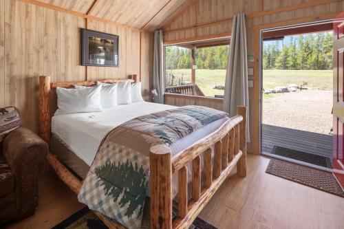 Una cama o camas en una habitación de Sky Eco - Cabins & Studios