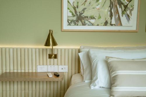 Ένα ή περισσότερα κρεβάτια σε δωμάτιο στο Terrazas Hotel Boutique