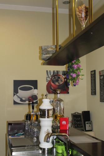 a kitchen counter with a sink and a mixer at Terme Villa Pace in Abano Terme