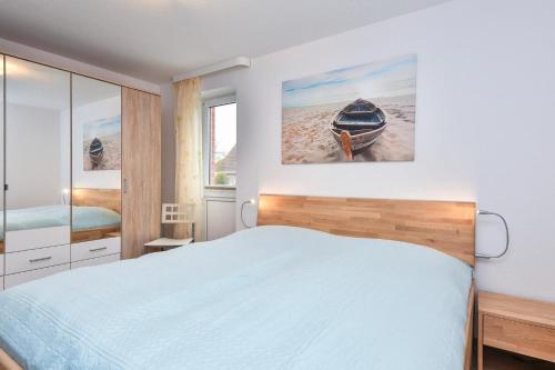 Postel nebo postele na pokoji v ubytování Lindenbuschen 2 Wohnung 2