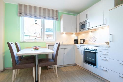 Kuchyň nebo kuchyňský kout v ubytování Waldstraße 16 Wohnung Eckhoff