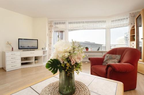 TV a/nebo společenská místnost v ubytování Grömitz Center Wohnung 759