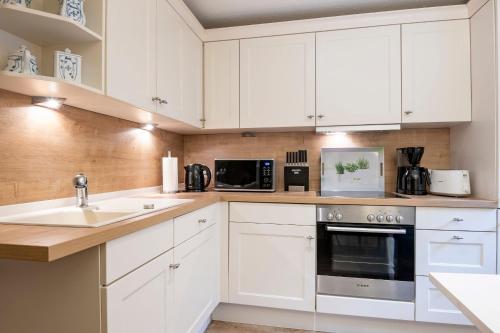 Kuchyň nebo kuchyňský kout v ubytování Rosenstraße 1b Suite