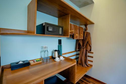 Kuchyň nebo kuchyňský kout v ubytování Komsan Kampot Resort