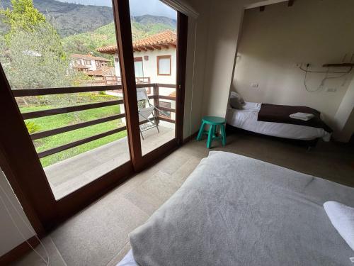 Ένα ή περισσότερα κρεβάτια σε δωμάτιο στο Apartasuites Las Marías