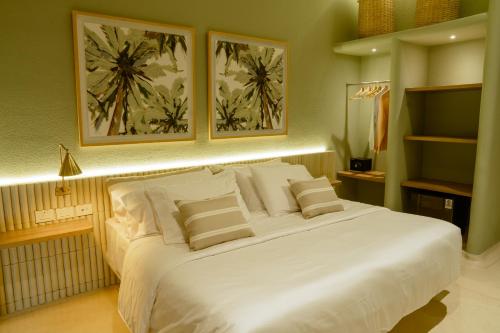Ένα ή περισσότερα κρεβάτια σε δωμάτιο στο Terrazas Hotel Boutique
