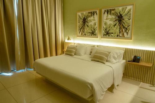 Ένα ή περισσότερα κρεβάτια σε δωμάτιο στο Terrazas Hotel Boutique