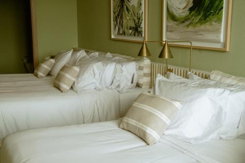 Ένα ή περισσότερα κρεβάτια σε δωμάτιο στο Terrazas Hotel Boutique