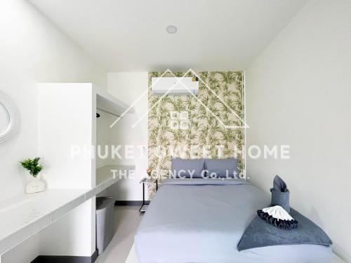 Postel nebo postele na pokoji v ubytování Naiharn Green Valley number 15 16