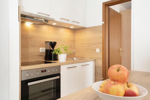 Η κουζίνα ή μικρή κουζίνα στο Haus Titania Wohnung 12