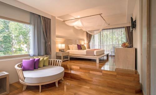 Кровать или кровати в номере Pakasai Resort - SHA Extra Plus