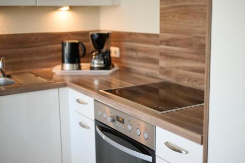 Dapur atau dapur kecil di Schlehenkamp 5 Meerglück