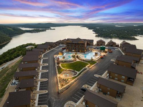 an aerial view of a resort on the water at High Cliff Cabin + Private Hot tub at Table Rock Lake in Kimberling City