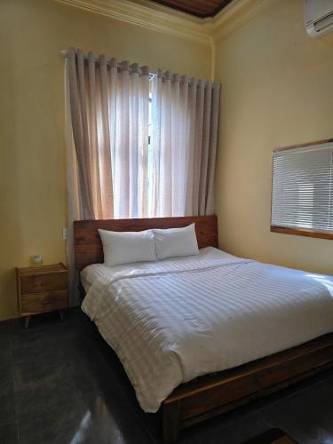 Letto o letti in una camera di a Hue Homestay