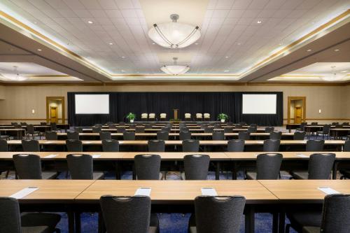 an empty conference room with tables and chairs at The Westin Austin at The Domain in Austin