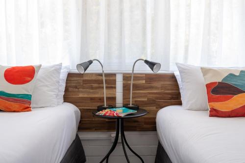 Ένα ή περισσότερα κρεβάτια σε δωμάτιο στο The Lyndoch Motel