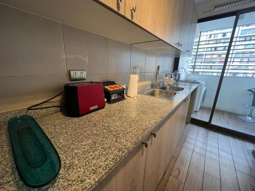 Kuchyň nebo kuchyňský kout v ubytování Gran depto en Barrio Italia - Condell