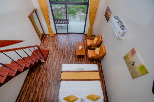 Posezení v ubytování Komsan Kampot Resort
