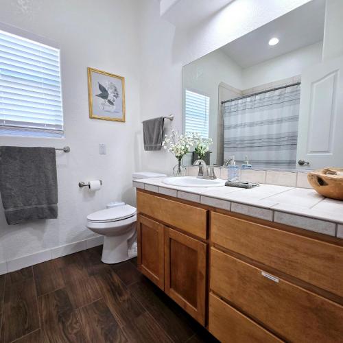 a bathroom with a sink and a toilet at The Fieldhouse in Blythe
